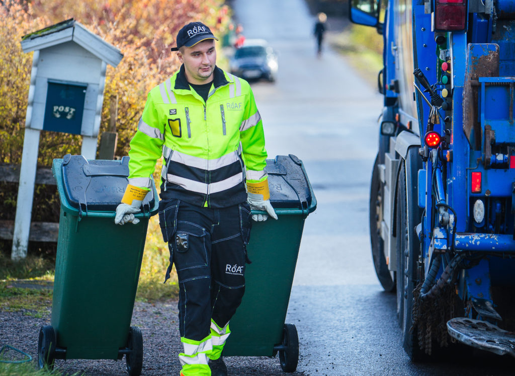 Sjåfør triller beholder_infoskjerm